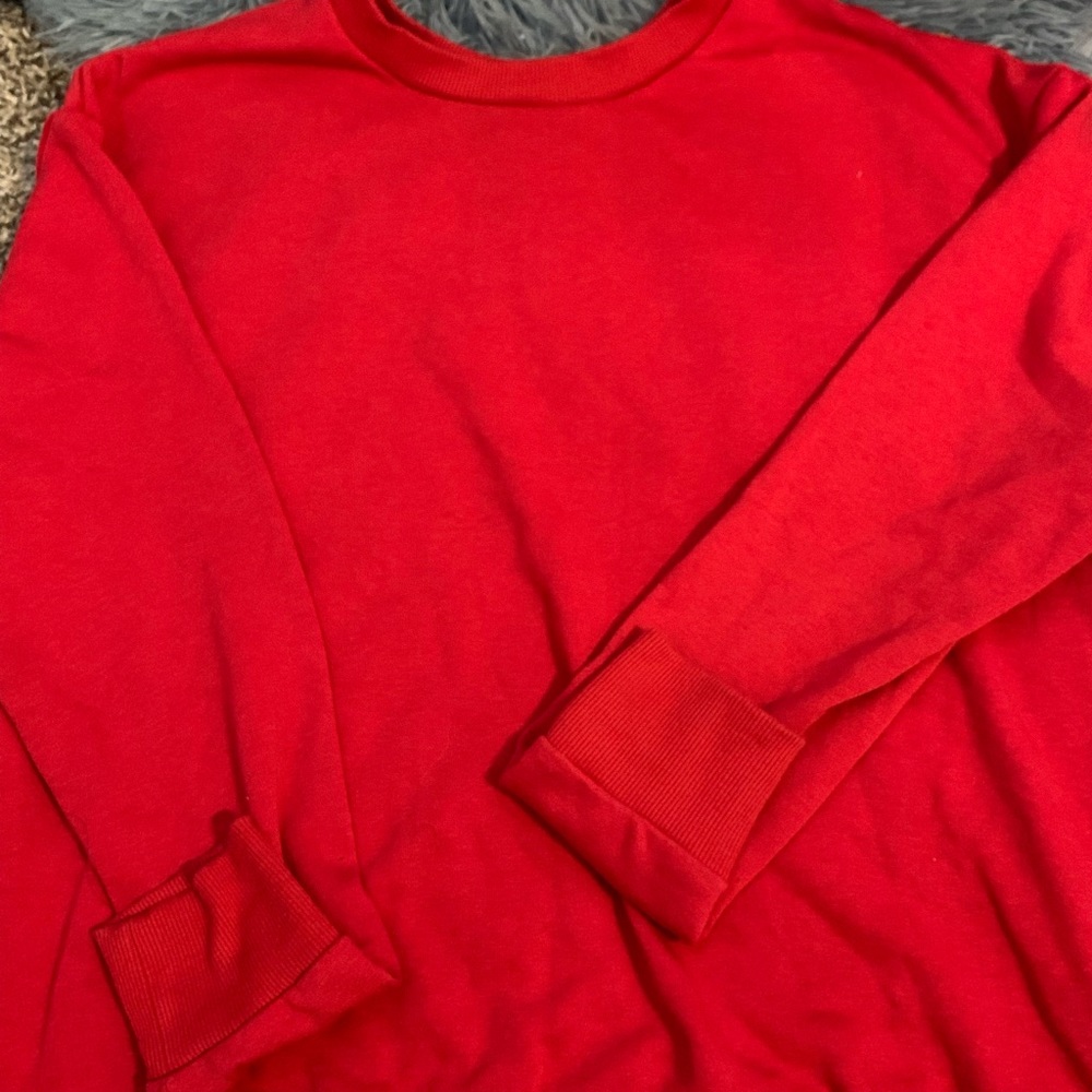 Plane red shirt.